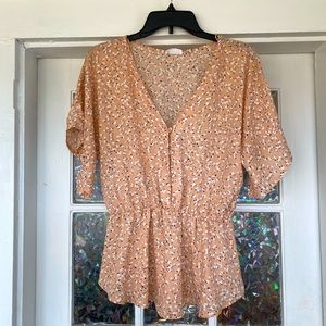 Size large Sienna Sky peplum top with flared sleeves and floral print